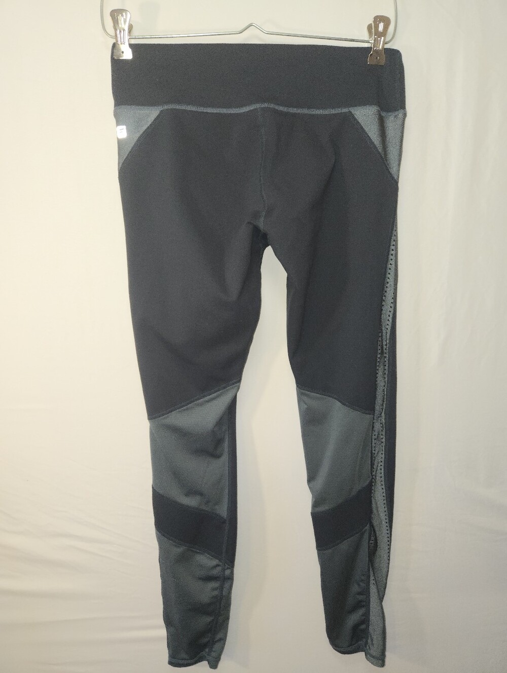 Fabletics US Womens Size S Bright Black Gray Leggings w Decorative Holes On Side